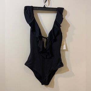 BECCA Black Ruffled Women’s one piece bathing suit.